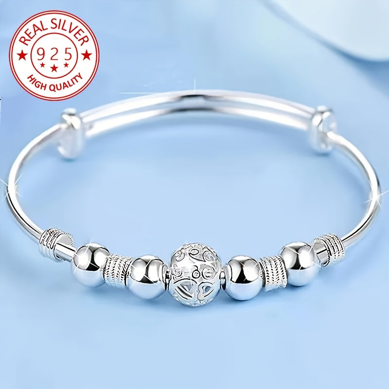Pulsera de encanto en plata 925 con diseño único de bola Linglong hueca. Ideal para el uso diario y fiestas, es el regalo perfecto para cumpleaños, bodas, Año Nuevo y San Valentín. ¡Añade un toque de sofisticación a tu estilo!