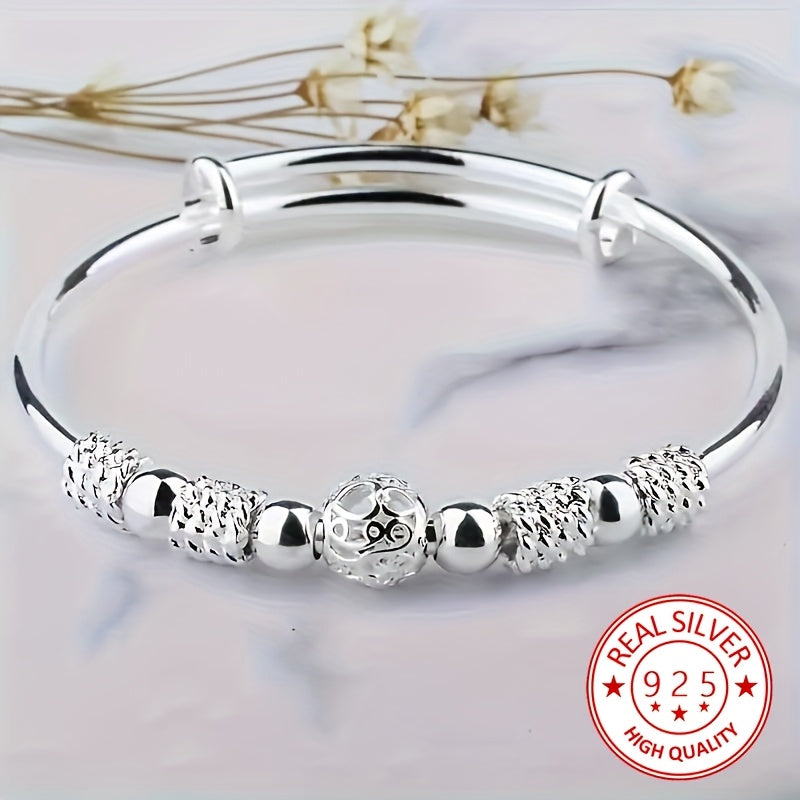 Pulsera de encanto en plata 925 con diseño único de bola Linglong hueca. Ideal para el uso diario y fiestas, es el regalo perfecto para cumpleaños, bodas, Año Nuevo y San Valentín. ¡Añade un toque de sofisticación a tu estilo!