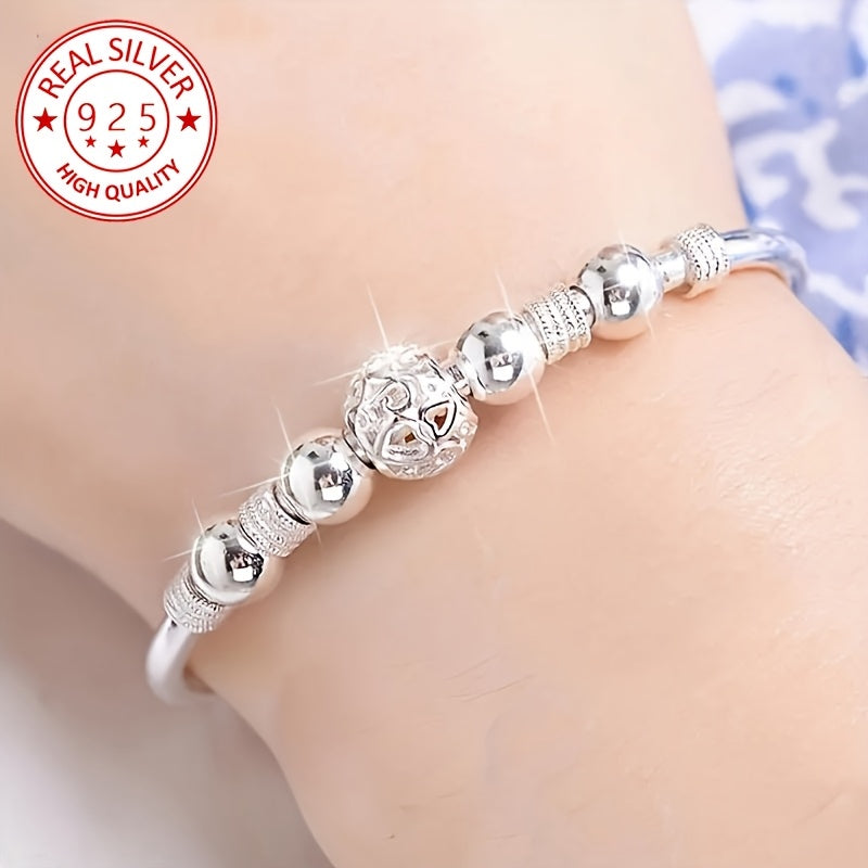 Pulsera de encanto en plata 925 con diseño único de bola Linglong hueca. Ideal para el uso diario y fiestas, es el regalo perfecto para cumpleaños, bodas, Año Nuevo y San Valentín. ¡Añade un toque de sofisticación a tu estilo!