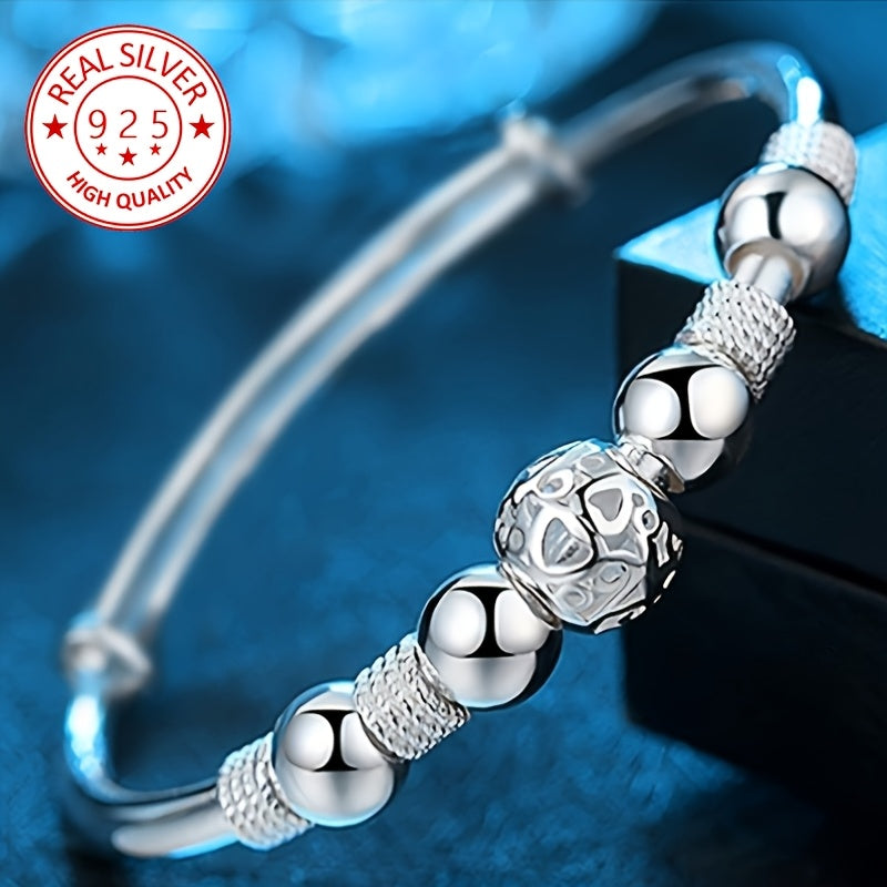 Pulsera de encanto en plata 925 con diseño único de bola Linglong hueca. Ideal para el uso diario y fiestas, es el regalo perfecto para cumpleaños, bodas, Año Nuevo y San Valentín. ¡Añade un toque de sofisticación a tu estilo!